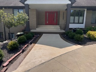 Dual-colour deck coating system, grey porch and tan walkway