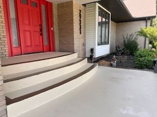 Residential front entrance with aircraft-grade deck coating and column detail