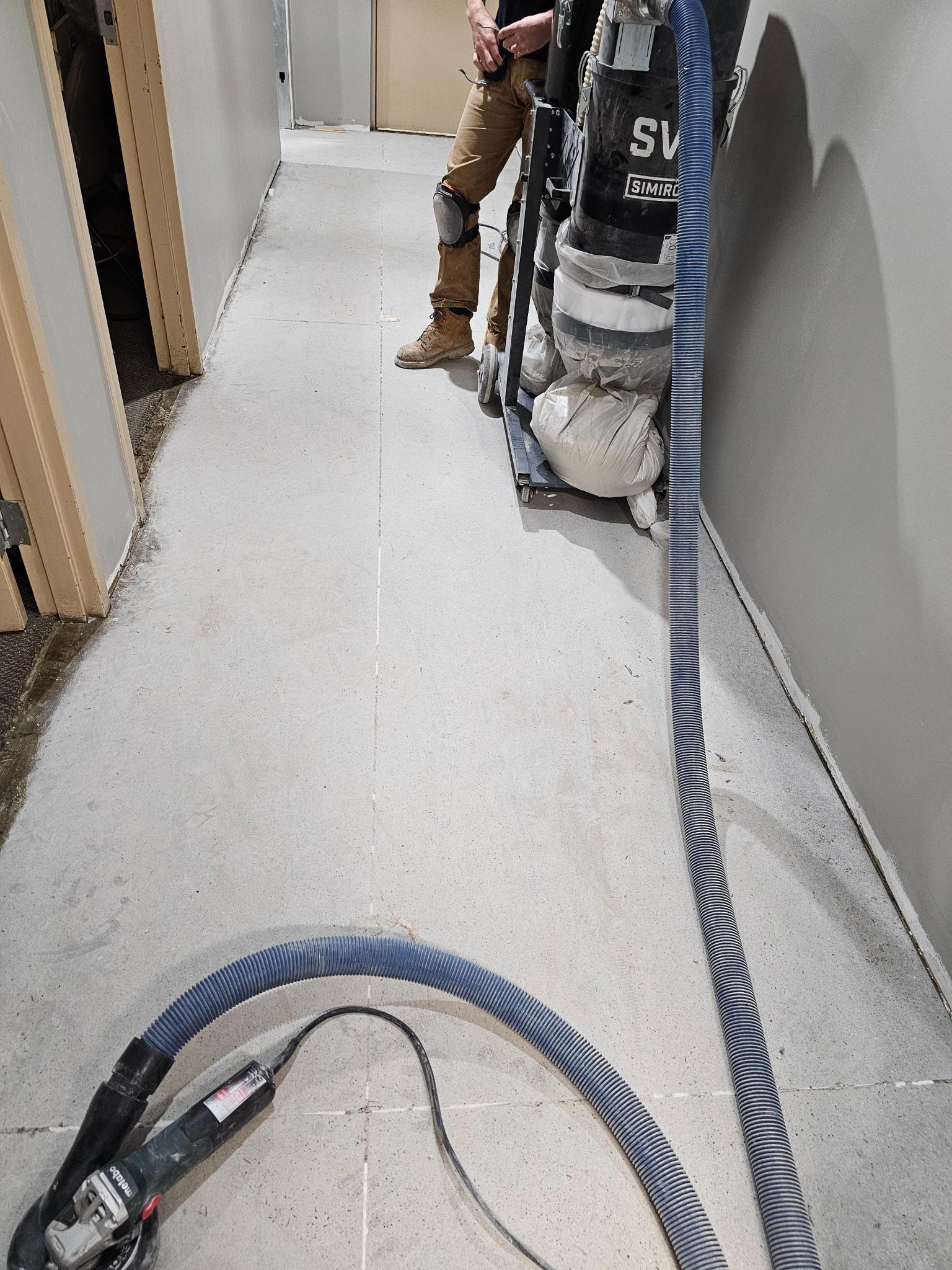 Surface preparation, grinding and cleaning the warehouse slab
