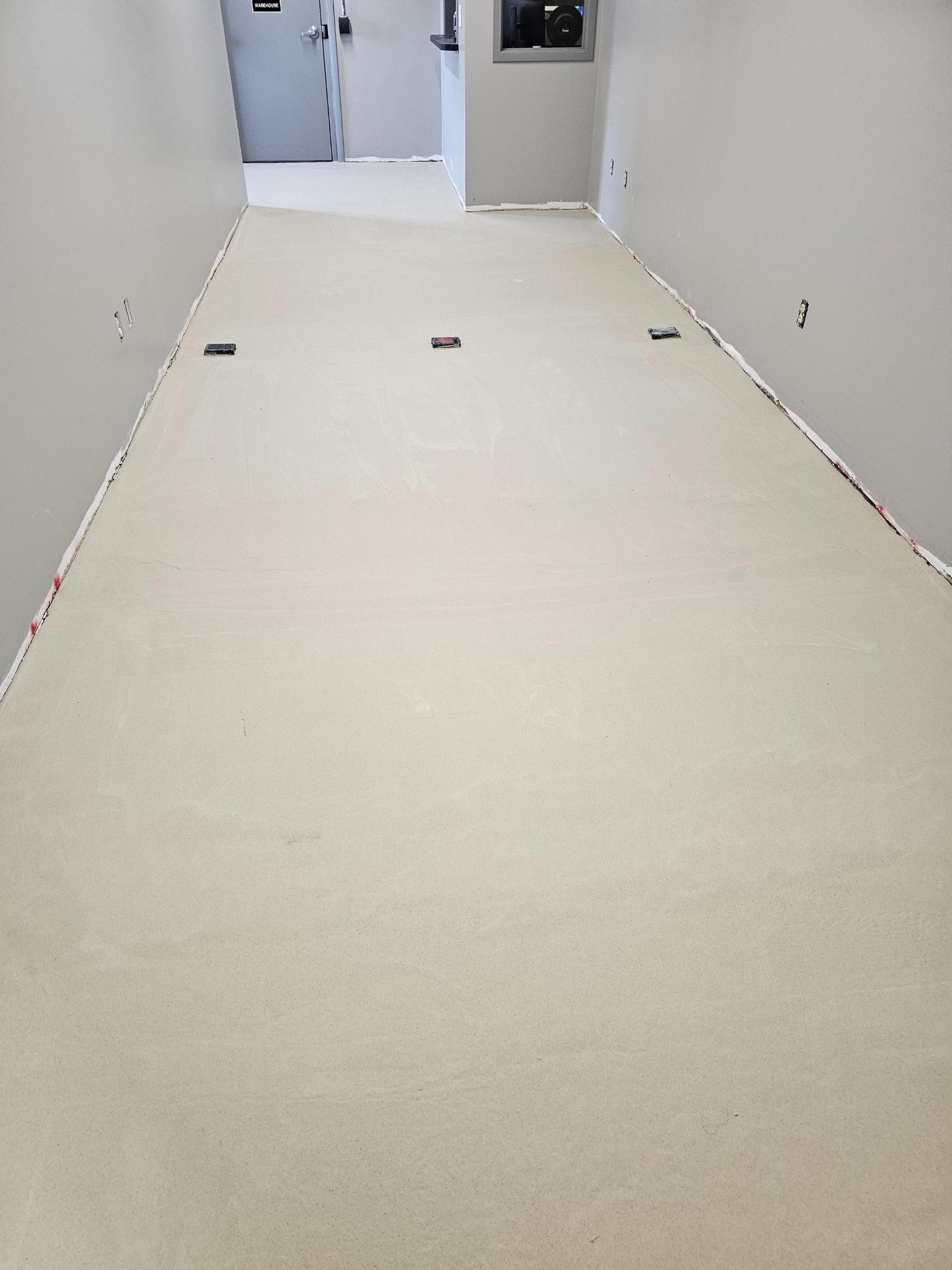 Seamless floor to wall transition, cove base detail