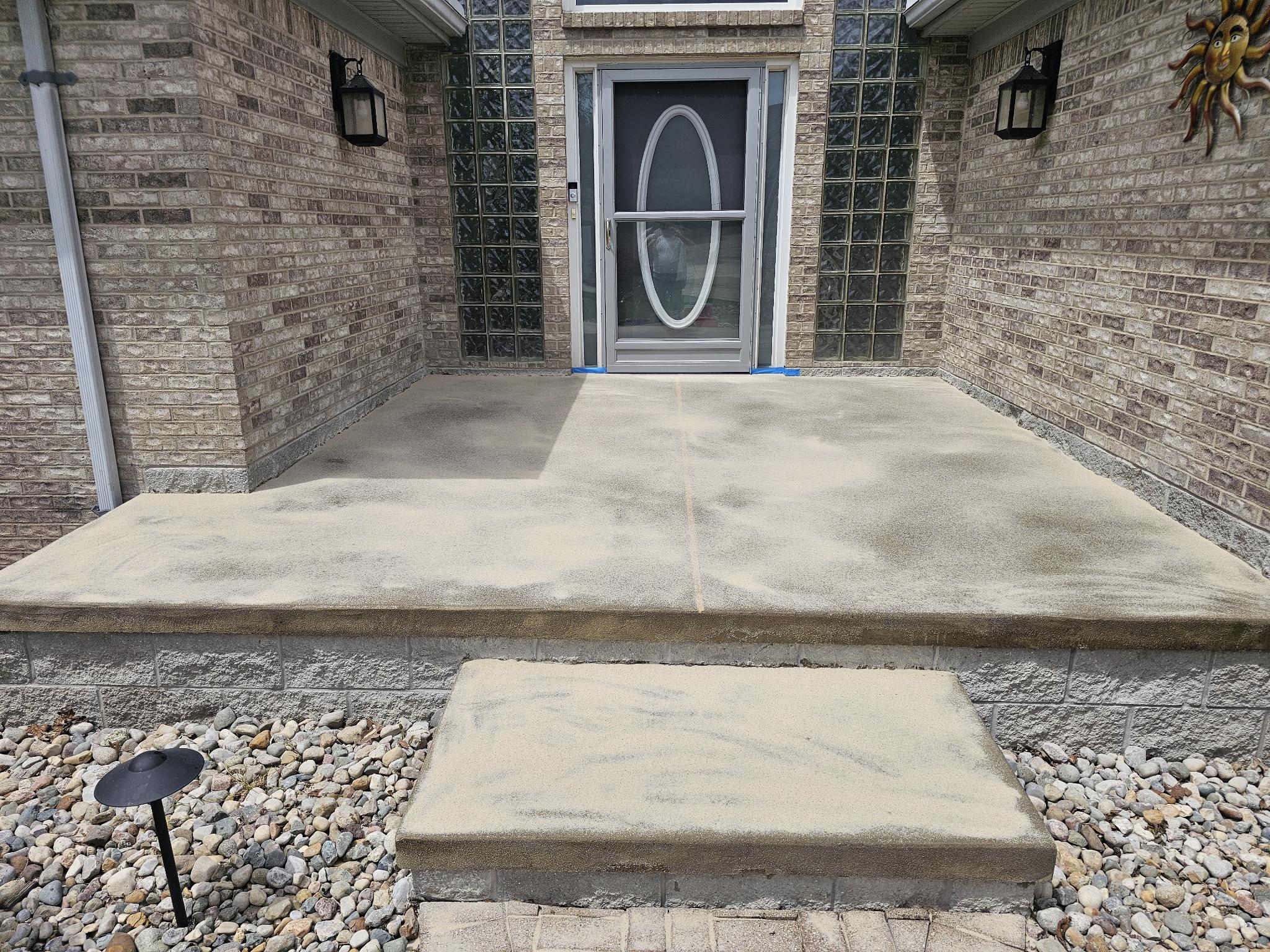 Residential deck before coating, weathered concrete surface