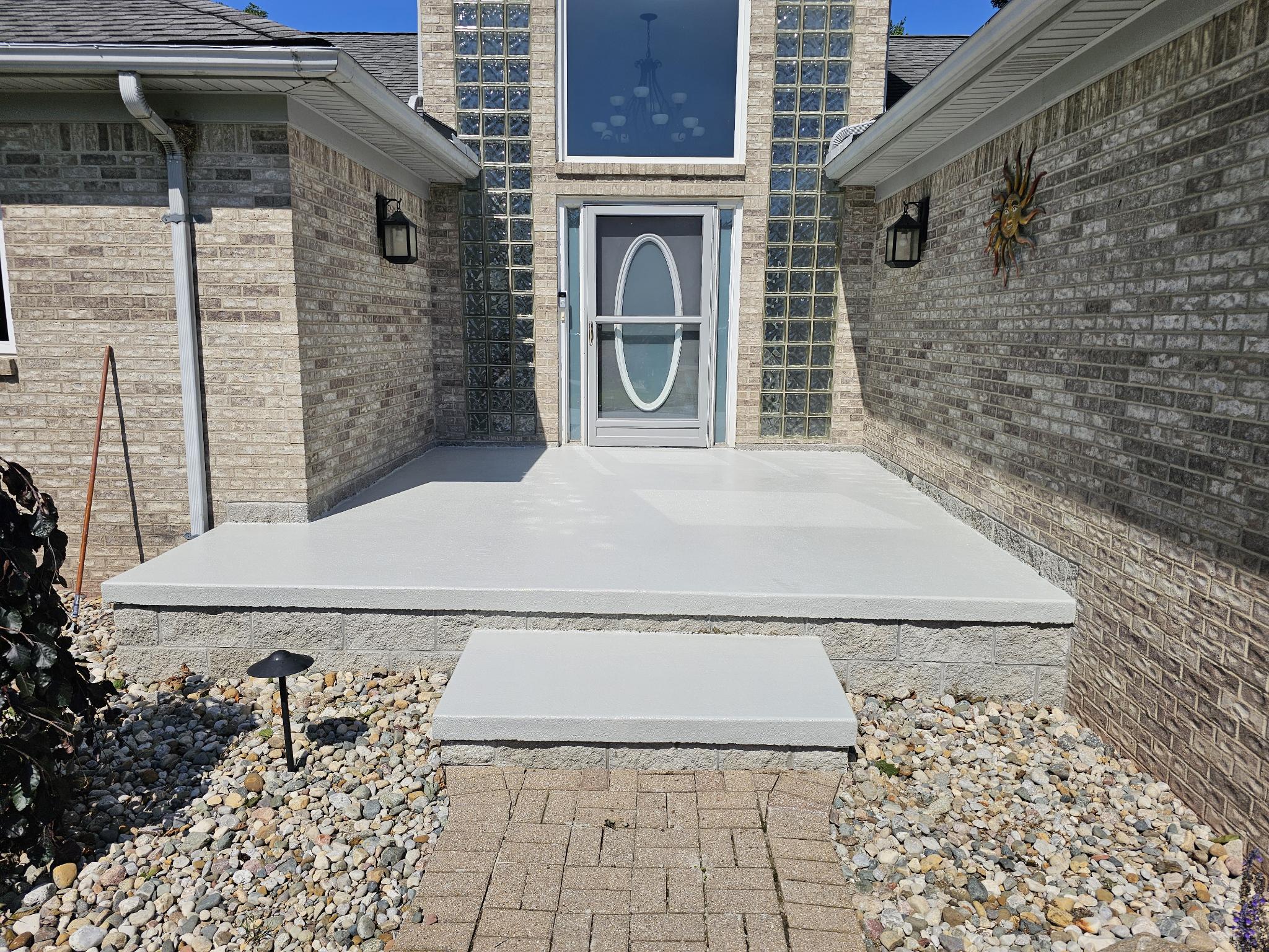 Completed residential deck coating with textured non-slip surface