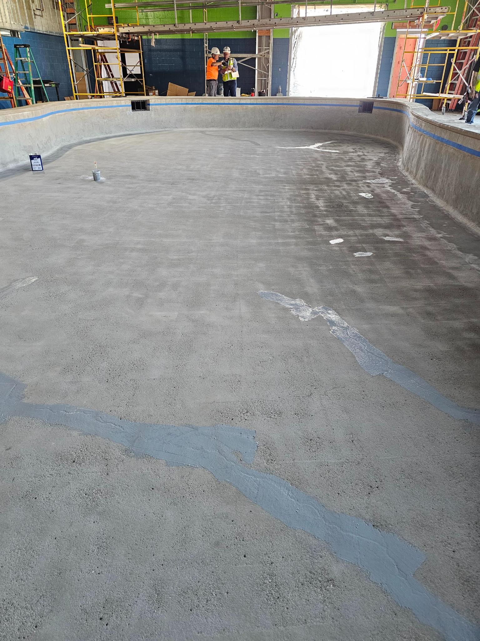 Waterproof coating being applied to the wildlife tank