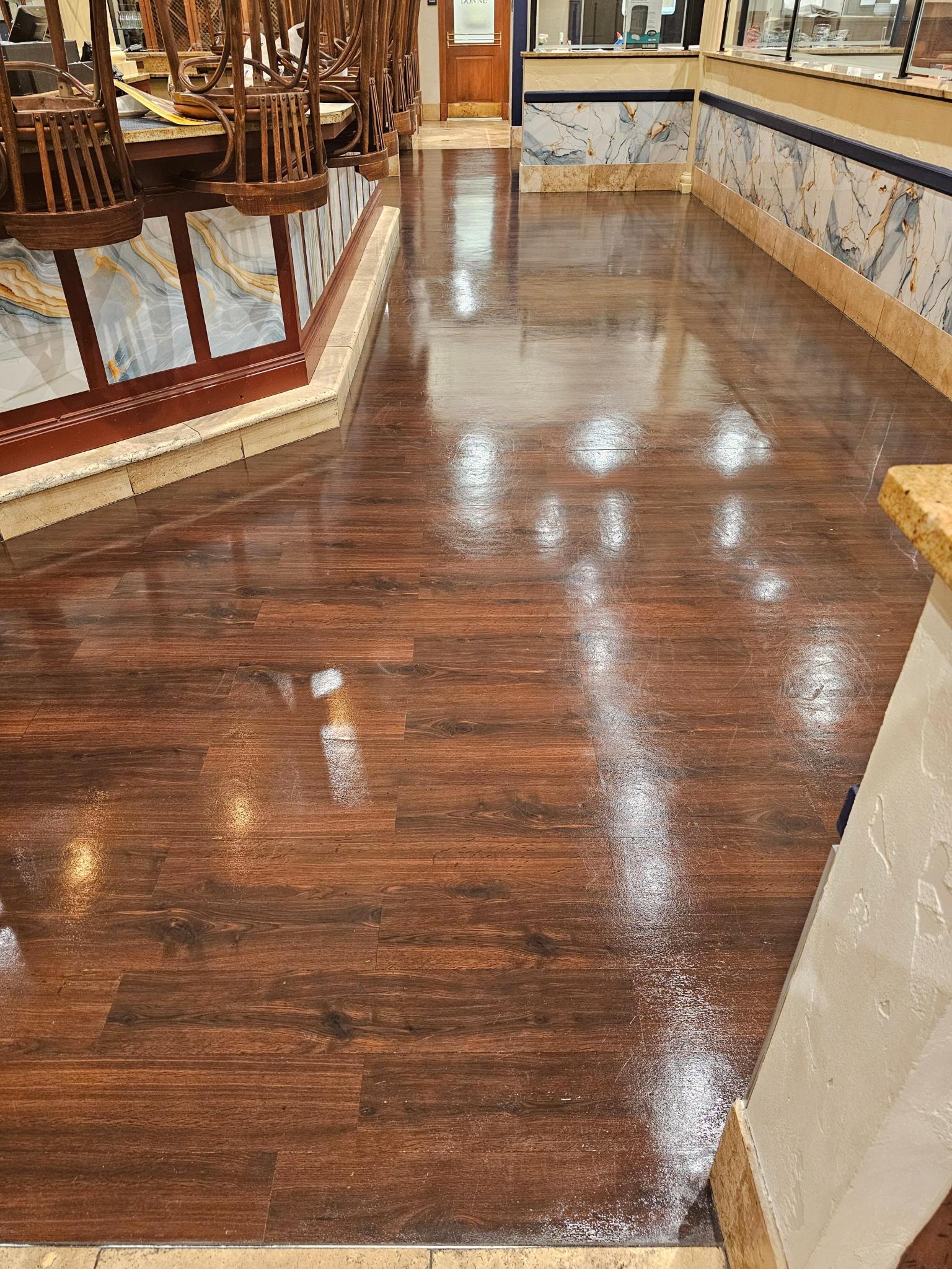 Refinished LVT flooring detail with high gloss finish