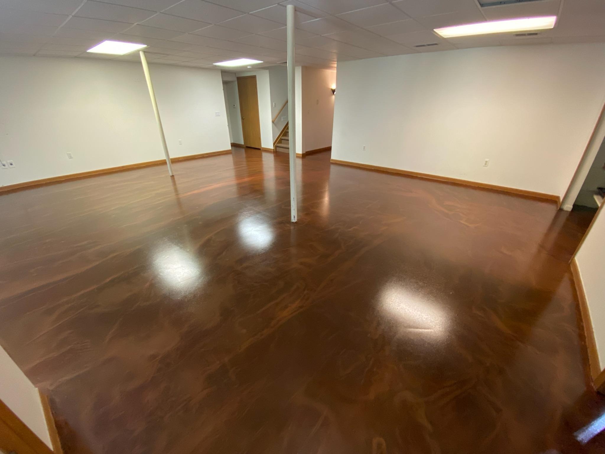 Metallic wood grain epoxy basement floor in Novi, custom decorative finish