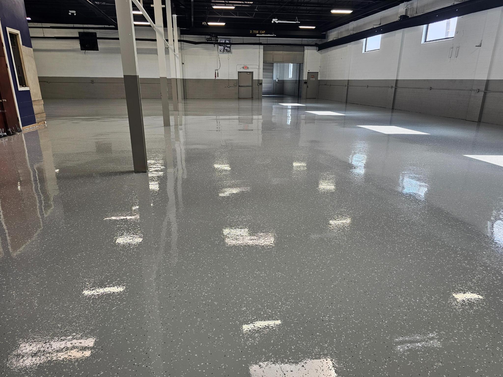 Rejuvenated machine shop floor with high-gloss chip broadcast finish