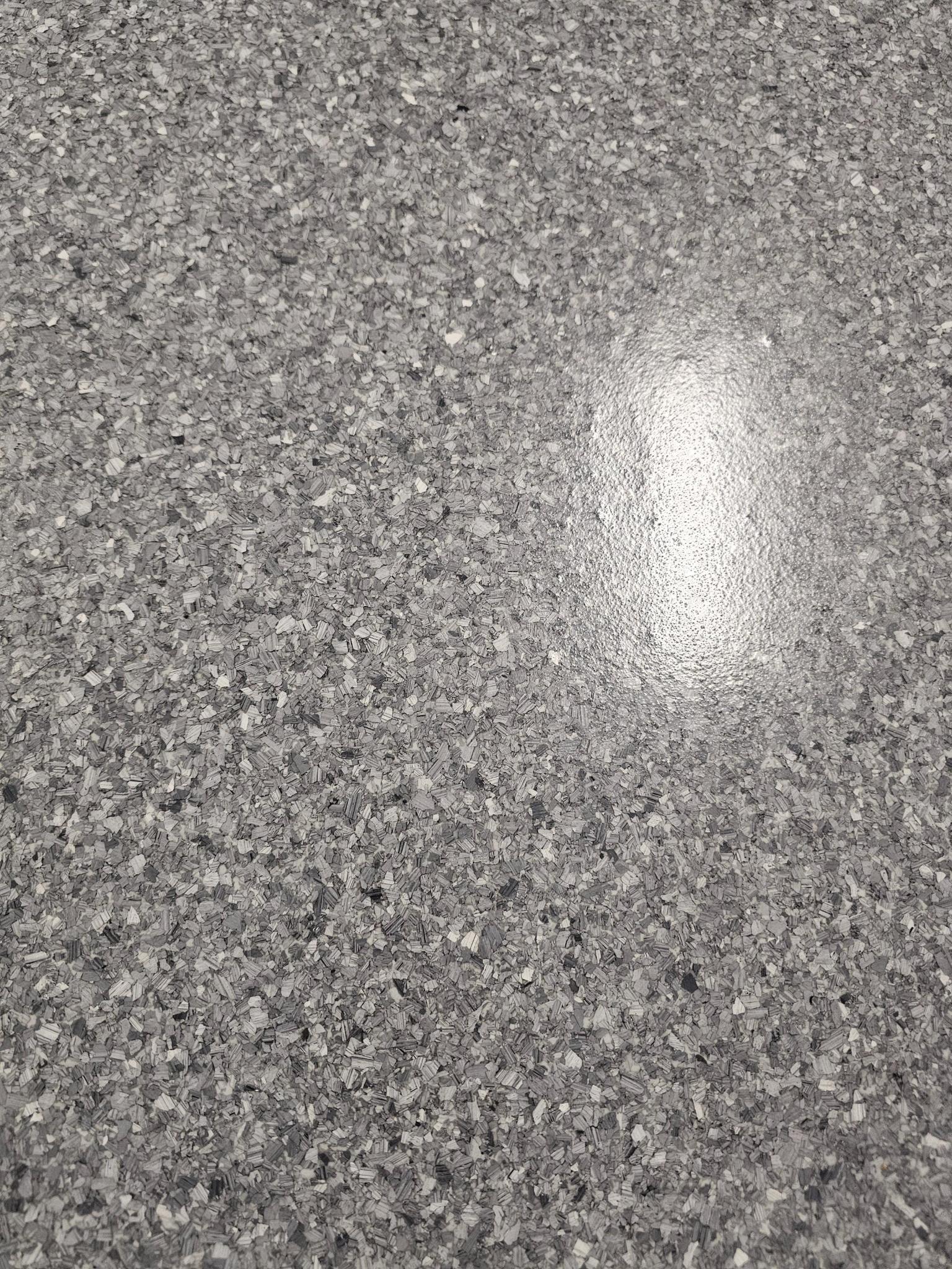 Residential basement epoxy close-up flake detail