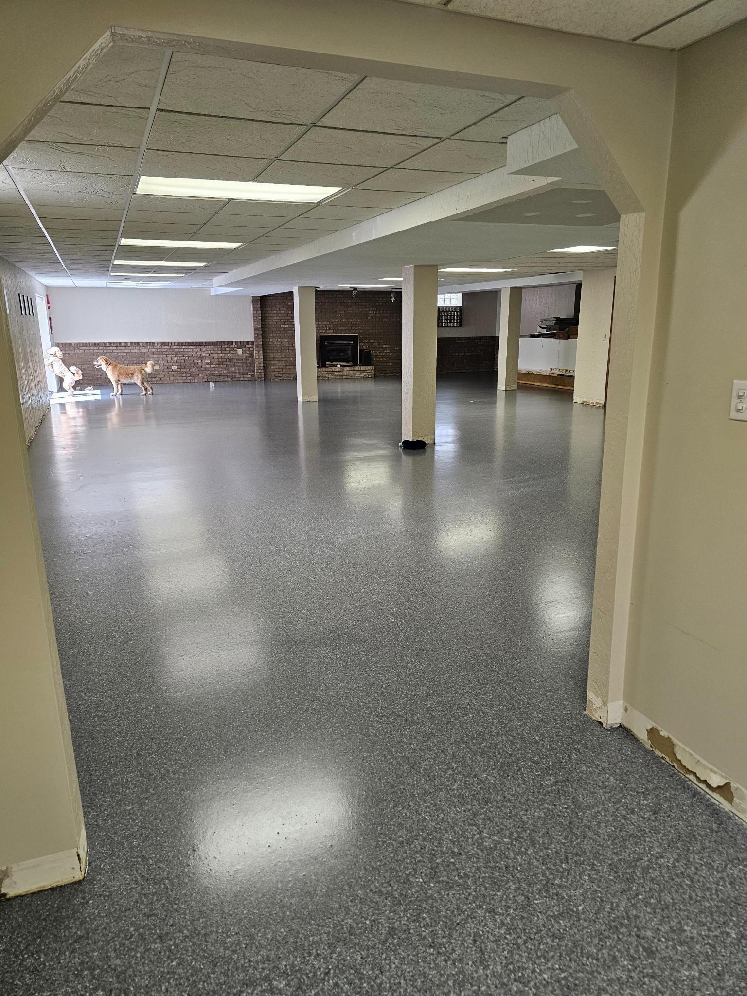 Large finished basement with chip broadcast epoxy system